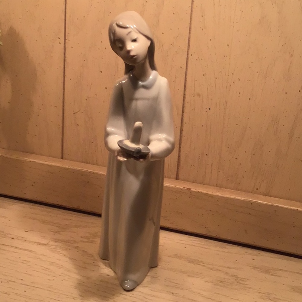 Lladro girl with candle